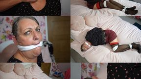 Marika, gilf teacher bound and hanky cleave gagged on the bed (mp4)