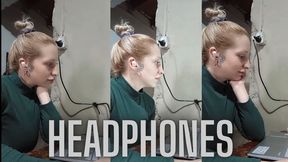 While you're watching, I'm concentrating... with my headphones on.