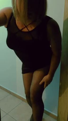 Sexy Blonde Crossdresser Black Mini Skirt Fishnet