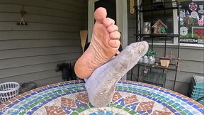 I show off my dirty socks and feet