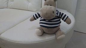 A plush toy on my crossed legs cc