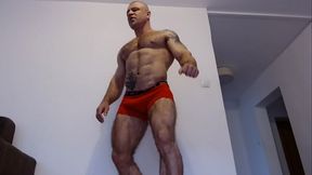 A muscular guy dances, poses and undresses...