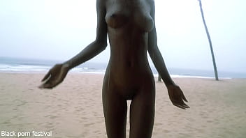 Skinny ebony village girl dancing naked in the rain with her perfect slim body