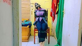 Hijab Indo Taped To A Chair