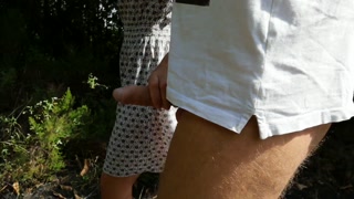 She loves to touch my cock while we walk in the neighbor's garden and I have to piss.