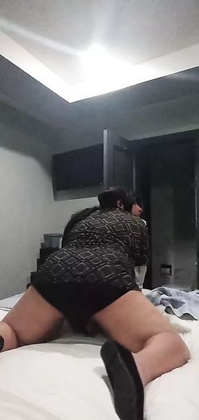 Dressed up Sissy shaking her ass for the fans