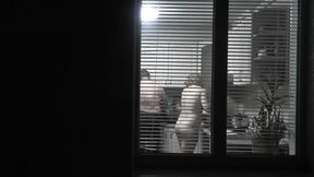 Family nudism . Naked stepdaughter cooking dinner walks naked in front of Dad at open window public