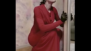 Modest crossdresser sucks black dildo