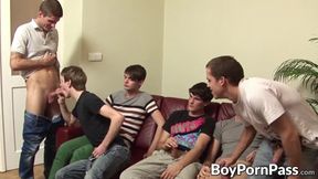 Twinks are sucking and fucking each other in bareback orgy