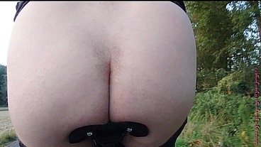 Dicker Arsch auf dem Fahrradsattel