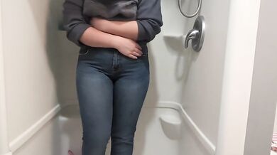 Naughty brunette drips piss down her thighs in frantic shower struggle