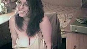 Nerdy brunette wifey showing off her big juggs on webcam