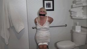 MILF bound and gagged in her full slip and girdle