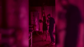 Slut beeing dressed up mid session for a break and a cigarette