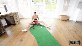 ”Aila Donovan is playing with mini-golf instructor's pole”