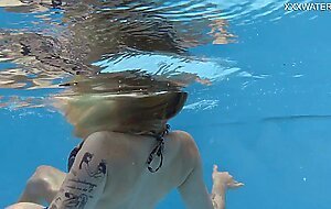 Cute blonde Finnish pornstar Mimi Cica underwater
