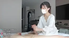 Japanese Girls In Negligee Gives A Guy A Handjob While Facesitting