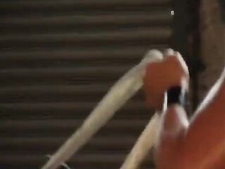 Fastened Hotty in Latex S&M Submission