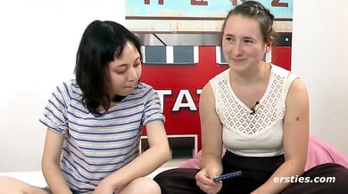 Yuli and Mira explore each other with fingers and toys