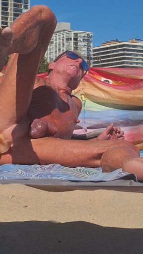 Key West oiled up using his new dildo at the beach