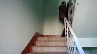 Fucked a neighbor in a fur coat on the stairwell while her husband at work!
