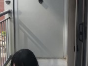 Crossdresser takes a smoke break while cuffed