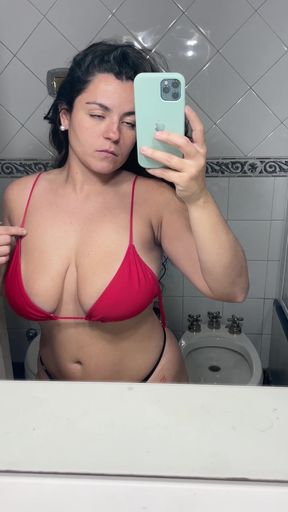 Amateur with big tits shows off her round ass