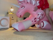Riding my pink inflatable unicorn