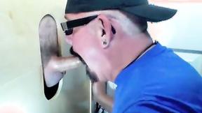 ”Dude getting a blowjob from an expert sucker in a gloryhole”