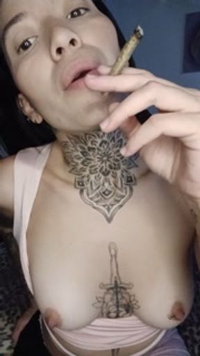 sexy latina smokes while masturbating with her feet