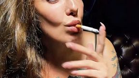 Smoking in shorts and a sports bra, no makeup – Newport Menthol