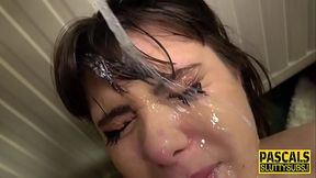 Real-life submissive takes a massive hard-on in her mouth while getting