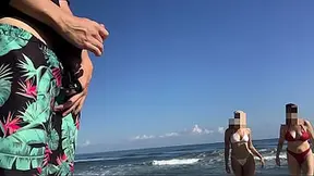 Lucky man meets two horny girls on the beach while masturbating in public