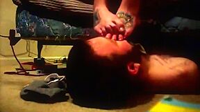 Guy With A Beard Sniffing Sexy Tattooed Amateur Feet On The Floor