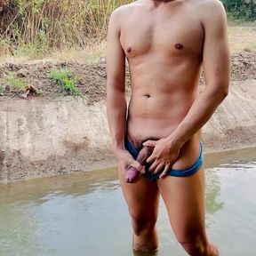 Jerk off and cum in public water.