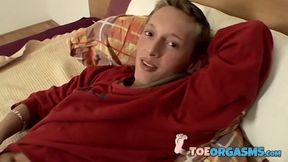 European Veso puts on an amazing foot show before masturbating his uncut cock