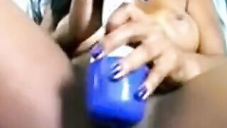 Black girl toys her wet pussy on webcam