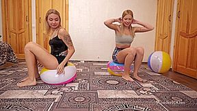 Girls sit pop balls