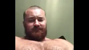 Muscle Bear Shows Off His Massive Cock and Tattoos in Domination Session