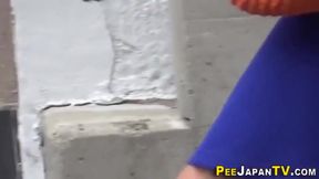 Jap Cutie Pisses in Parking Lot