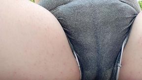 risky sunbathing in the public garden with a big diaper