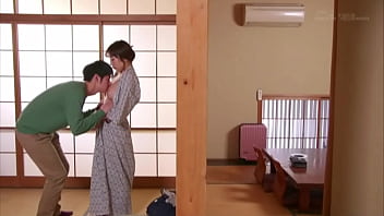 Hachino Tsubasa's sexy Asian MILF chews on big tits