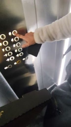 Tomas in elevator takes 3