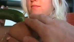 Wondrous busty blonde chick masturbates with cucumber