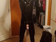Performing exercises for Sir while plugged, in chastity and in skintight rubber head to toes