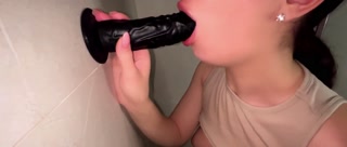 Bitch with big boobs was caught in shower with dildos