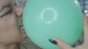 Biting my balloon with all my might