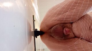 White fishnet bodystocking, panties and dildo