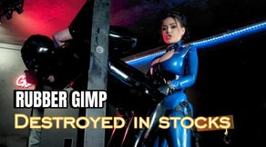 Rubber gimp destroyed in the stocks