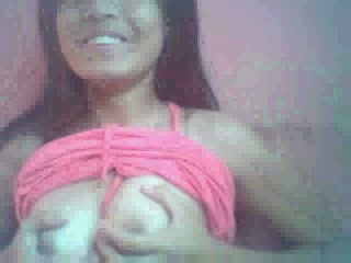 Big boobed Pinay webcam whore plays with her rack for me